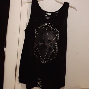 Torrid skull tank with sacred geometry